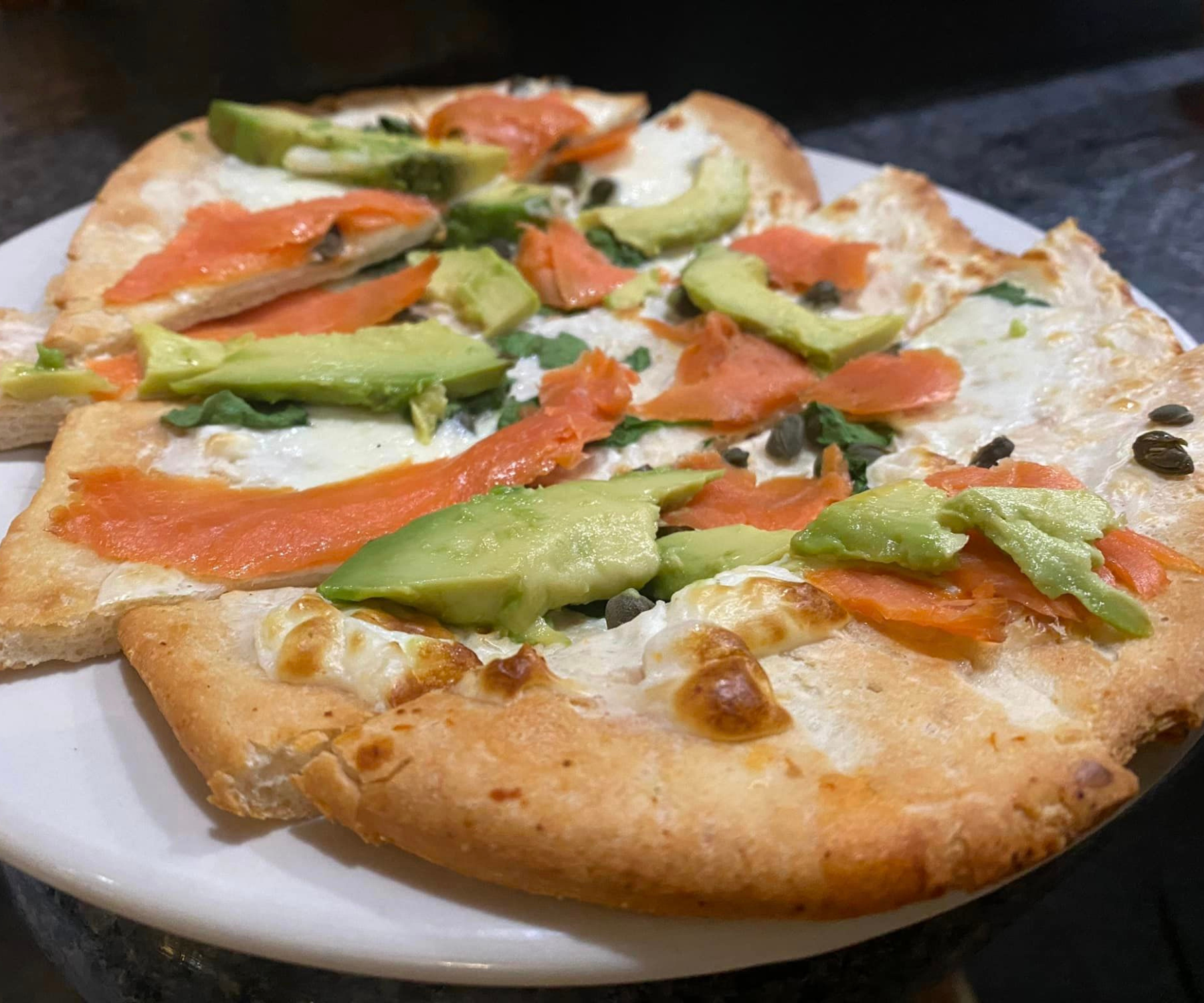 Close up of a delicious flatbread pizza at Darlington Country Club's dining area